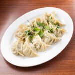 canuckpizza chickensteammomo